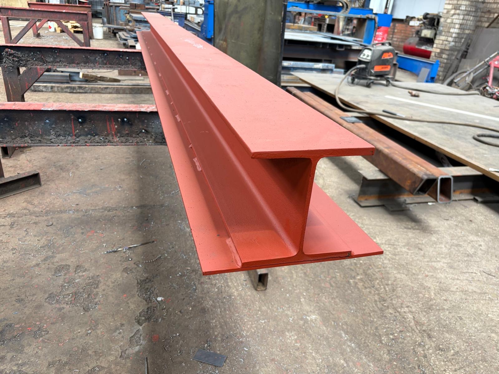 Painted red I-beam ready for dispatch